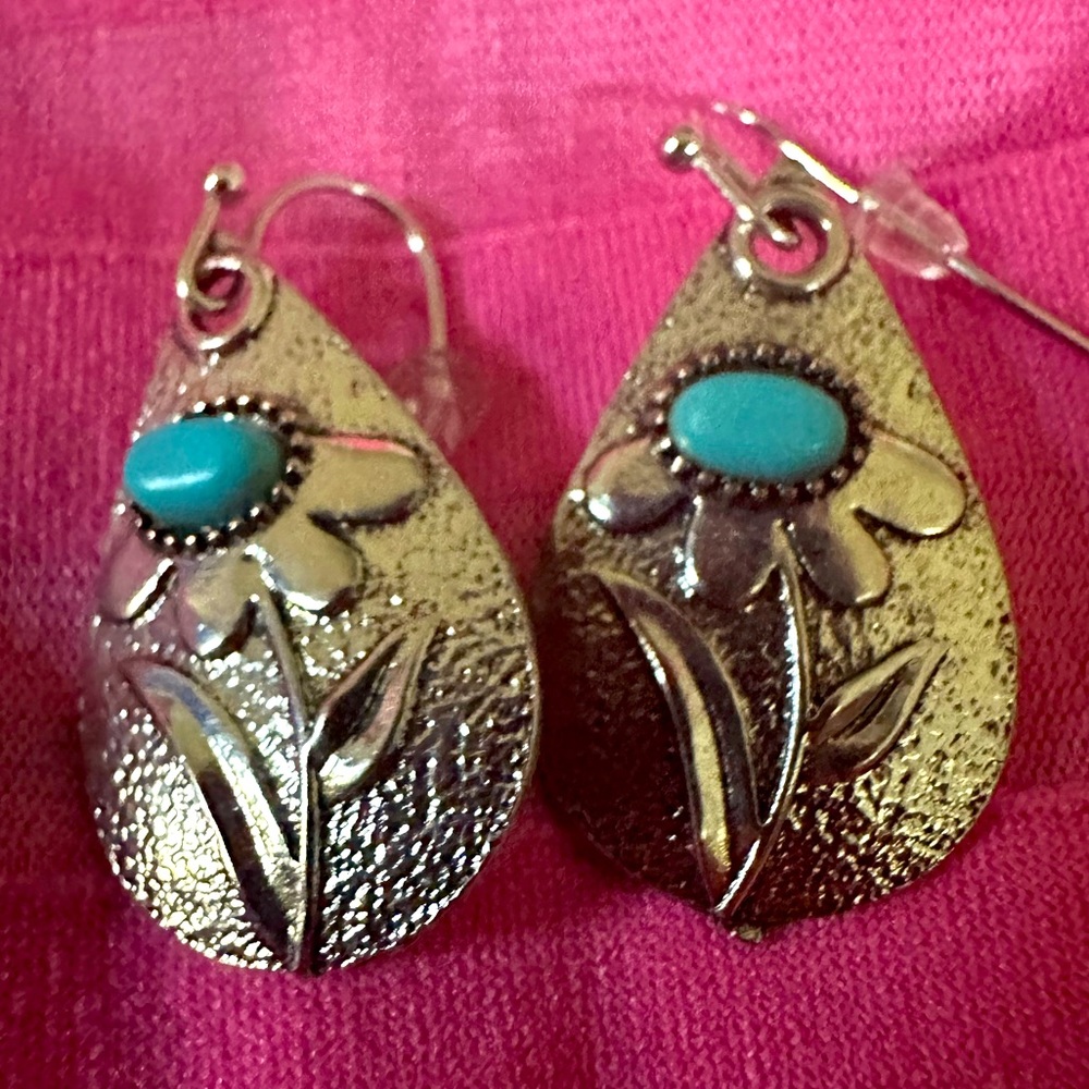 Silvery, boho style, flower earrings with “turquoise” colored stone center.